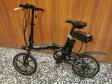 Bicicletta elettrica di colora nero, modello Momo Design New York 16