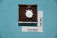 Custodia in pelle marrone marca “Michael Kors” con all’interno orologio in acciaio color argento con brillanti marca “Guess”