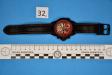 Nr.1 orologio di colore nero con quadrante rosso, marcato Calvaneo +1583 , con cinturino in pelle nera